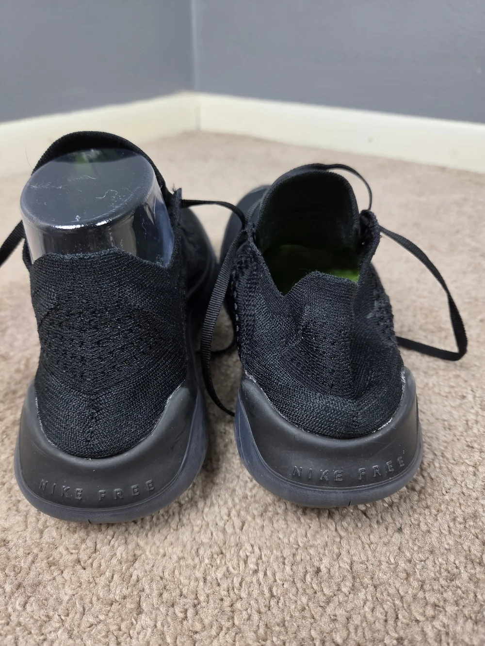 Nike Men's Black Knit Running Shoes with Green Accents